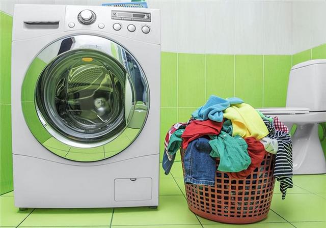 洗衣机过滤网清洗方法,洗衣机脏污盒取出图解(4)